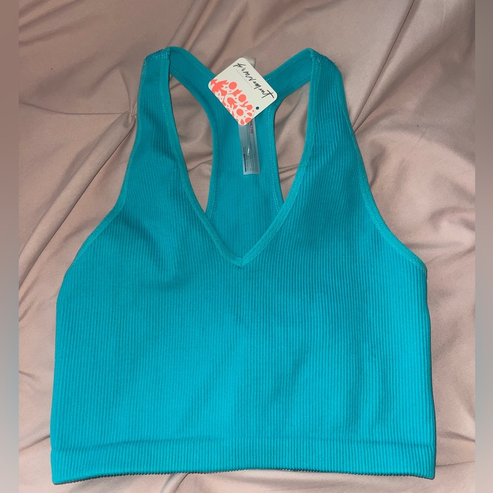 never worn teal free people tank size medium !